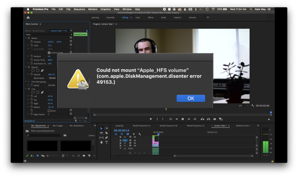 Adobe Premiere window showing a hard drive error alert.