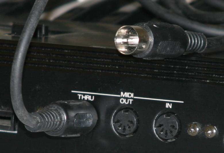 MIDI cable connected to 5-pin MIDI port